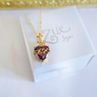 colgante corazon de jesus plata de primera ley con baño de oro packaging zuejoyas